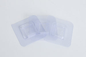 Branch holder -clear adhesive pads that sticks to the white PVC sides