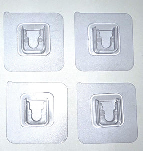 Branch holder -clear adhesive pads that sticks to the white PVC sides